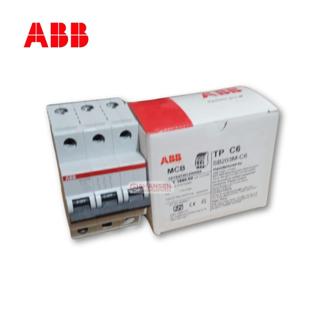 The image shows the ABB SB203M-C6 Miniature Circuit Breaker (MCB) placed beside its original packaging box. The 3-pole MCB is rated at 6A and 415V, from AB